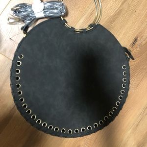 Anthropologie Round Whipstitched Faux Leather